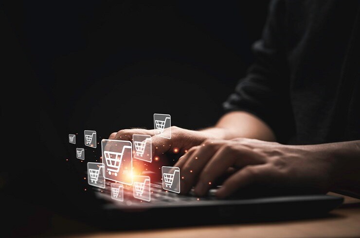 businessman-using-computer-laptop-with-shopping-trolley-cart-icon-input-order-online-shopping-concept_50039-2872